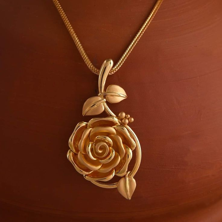 Women gold pendent